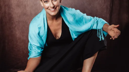 Blonde woman in blue shawl