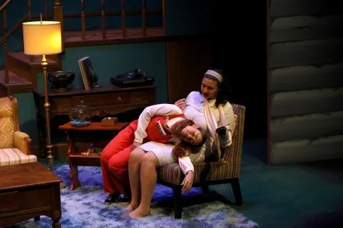 kid draped on mom's lap